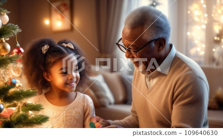 happy dreamy adorable african american beautiful girl decorating Christmas tree with happy Grandfather, putting toys on branches, enjoying preparing for New Year celebration home, miracle time happy dreamy adorable african american beautiful girl decorating Christmas tree with happy Grandfather, putting toys on branches, enjoying preparing for New Year celebration home, miracle time 109640630