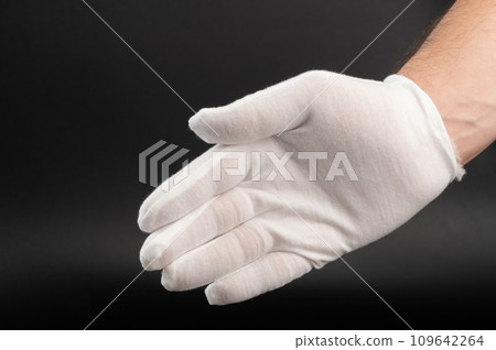 Palm hand in white glove 109642264