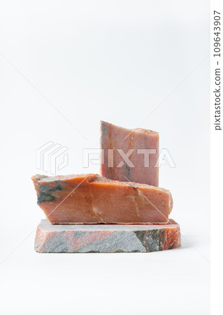 Pieces of polished granite isolated on white background Pieces of polished granite isolated on white background 109643907