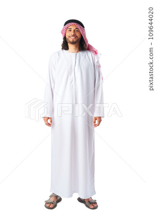 Full-length portrait of young middle-east man in thobe dress on white background 109644020