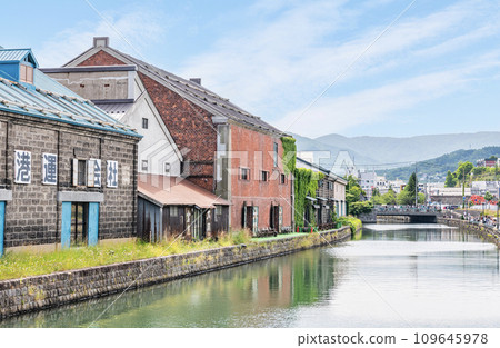 Otaru City, Hokkaido, a popular tourist destination in Hokkaido, a view of the Otaru Canal and warehouses in early summer Otaru City, Hokkaido, a popular tourist destination in Hokkaido, a view of the Otaru Canal and warehouses in early summer 109645978