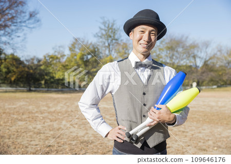 image of a man juggling image of a man juggling 109646176