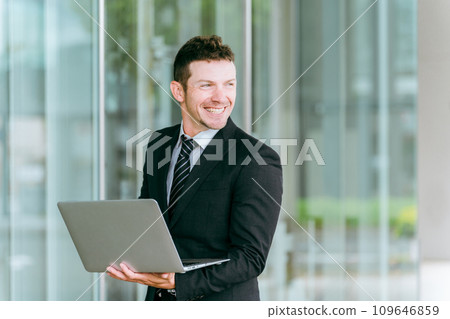 Western businessman with a laptop (lol) 109646859