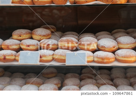 chocolate donuts display for sale at local store chocolate donuts display for sale at local store 109647861