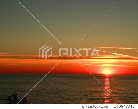 The sun setting over the Baltic Sea around 10pm 109648313