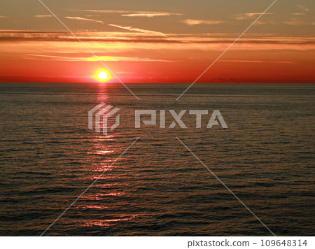 The sun setting over the Baltic Sea around 10pm 109648314