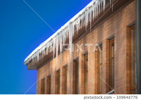 Large collection crystalline and glistening icicles 109648776