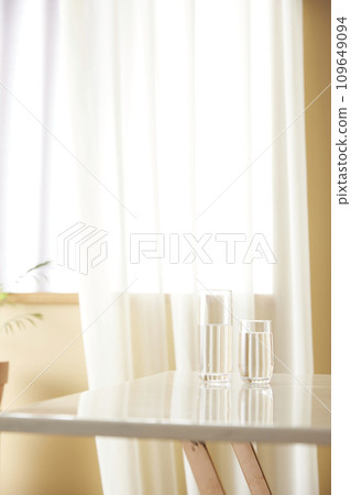 A cozy, bright room with sunlight streaming in. A cozy, bright room with sunlight streaming in. 109649094