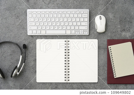 Notebook on desk overhead shot 109649802