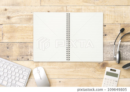Notebook on desk overhead shot 109649805