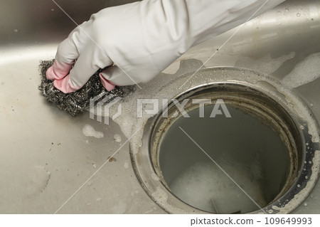 Dirty drains: Scrub with a brush and scrubber Dirty drains: Scrub with a brush and scrubber 109649993