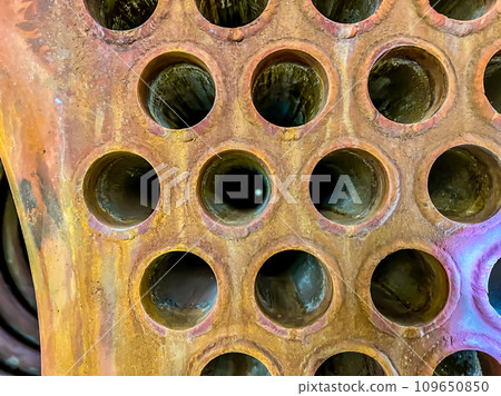 Central firing chamber of a plate and tube boiler that is open for maintenance and repair.  109650850