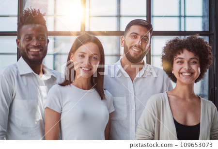 Smiling professional business leaders and employees group team portrait 109653073