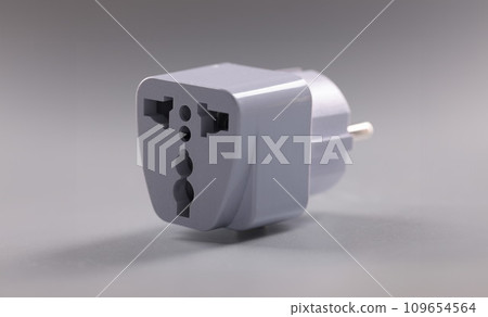Universal white plugs adapter, adapter to put in sockets Universal white plugs adapter, adapter to put in sockets 109654564