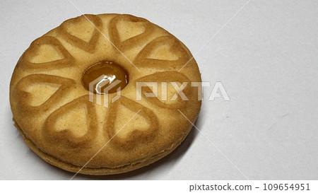 Pineapple jam biscuits, cookie neatly arranged and photographed on a plain white background 109654951