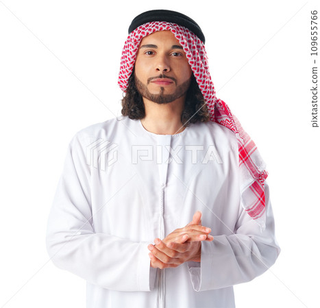 Portrait of a young Arab man wearing middle-eastern traditional dress thobe isolated on white 109655766