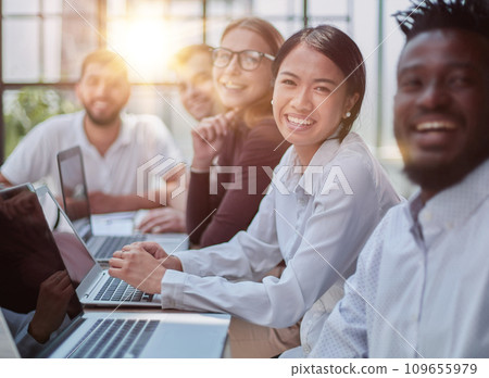 Multiethnic business people working together in the office Multiethnic business people working together in the office 109655979