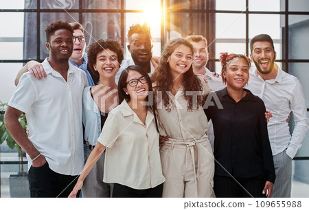 Team at work. Group of young business people in smart casual wear working together in creative office 109655988