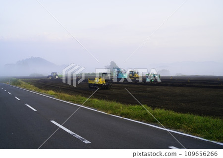 heavy machinery in the fog heavy machinery in the fog 109656266