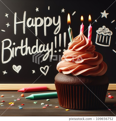 Birthday cupcake in front of a chalkboard. words HAPPY BIRTDAY!!! on chalk board. Birthday cupcake in front of a chalkboard. words HAPPY BIRTDAY!!! on chalk board. 109656752