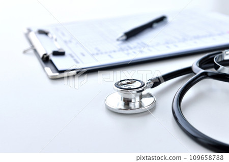 Empty Doctor's Desk - Stethoscope and Chart Empty Doctor's Desk - Stethoscope and Chart 109658788
