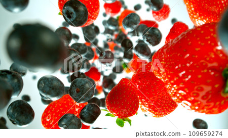 Freeze motion shot of falling and rotating berries, white background. Filmed on high speed cinematic camera at 1000 fps. 109659274