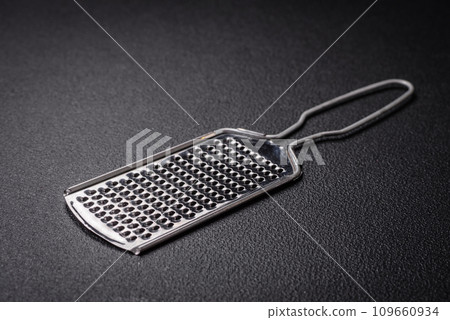 Beautiful small metal kitchen grater with handle Beautiful small metal kitchen grater with handle 109660934