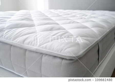 Detail of the mattress protection in the bed 109661480