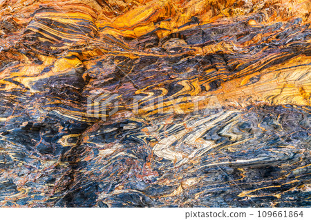 Natural marble stone background with cracks and colourful layer 109661864