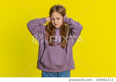 Frustrated young school girl kid covering ears ignoring unpleasant noise loud voices avoiding advice Frustrated young school girl kid covering ears ignoring unpleasant noise loud voices avoiding advice 109662213