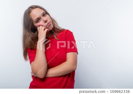 Headshot portrait of a European teenage girl with brown hair Headshot portrait of a European teenage girl with brown hair 109662336