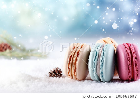 Colorful French macaroons on a winter Christmas background 109663698