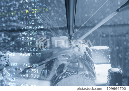 Abstract scene the CNC milling machine cutting mold part and G-code data back ground. Abstract scene the CNC milling machine cutting mold part and G-code data back ground. 109664700