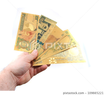 golden euro bankonotes in human hand 109665221