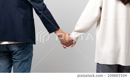 A man holding hands A man holding hands 109665504