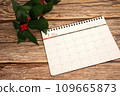 Calendar and Senryo placed on a wooden table 109665873