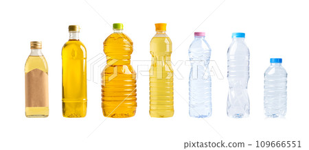 Vegetable oil with olive oil and water in different bottle for cooking isolated on white background with clipping path. 109666551