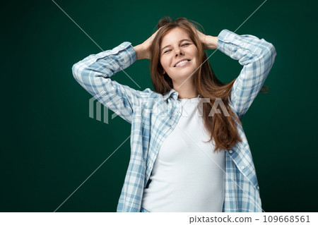 Attractive woman with naturally long brown hair Attractive woman with naturally long brown hair 109668561