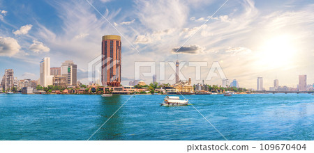 Nile and Gezira island view, beautiful panorama of Cairo downtown, Egypt Nile and Gezira island view, beautiful panorama of Cairo downtown, Egypt 109670404