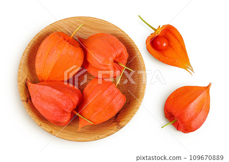 Cape gooseberry, physalis in wooden bowl isolated on white background with full depth of field. Top view. Flat lay 109670889