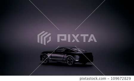 Silhouette of black sports car. Side view on a black background. Copy space. 109672829