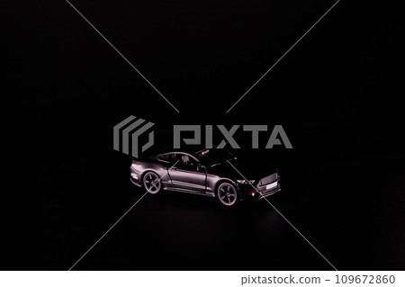 Silhouette of black sports car. Side view on a black background. Copy space. Silhouette of black sports car. Side view on a black background. Copy space. 109672860