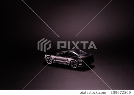 Silhouette of black sports car. Side view on a black background. Copy space. Silhouette of black sports car. Side view on a black background. Copy space. 109672869