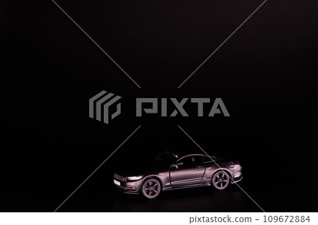 Silhouette of black sports car. Side view on a black background. Copy space. Silhouette of black sports car. Side view on a black background. Copy space. 109672884