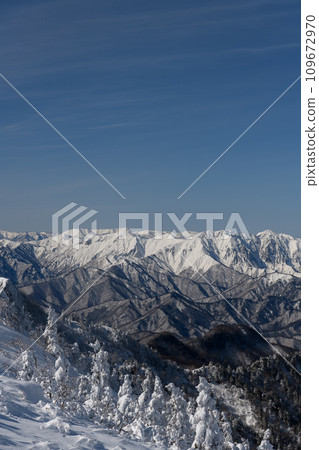Mt. Tanigawa in winter seen from the mountain trail heading from Mt. Kengamine to Mt. Buson 109672970