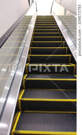escalator inside the building escalator inside the building 109673793