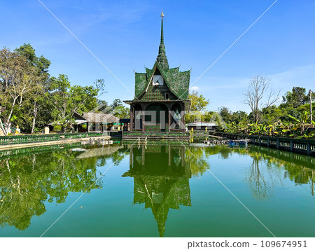 Wat Pa Maha Chedi Kaew or Wat Lan Khuad beer temple or million bottles temple, in Sisaket, Thailand Wat Pa Maha Chedi Kaew or Wat Lan Khuad beer temple or million bottles temple, in Sisaket, Thailand 109674951