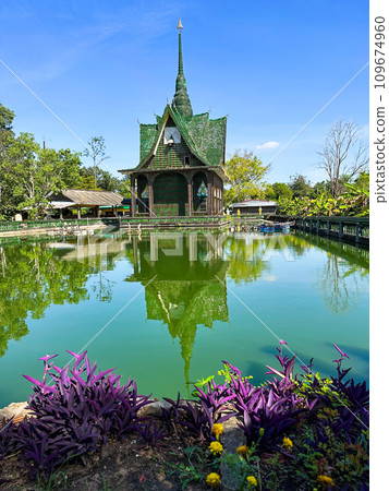 Wat Pa Maha Chedi Kaew or Wat Lan Khuad beer temple or million bottles temple, in Sisaket, Thailand Wat Pa Maha Chedi Kaew or Wat Lan Khuad beer temple or million bottles temple, in Sisaket, Thailand 109674960