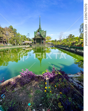Wat Pa Maha Chedi Kaew or Wat Lan Khuad beer temple or million bottles temple, in Sisaket, Thailand 109674970