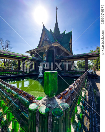 Wat Pa Maha Chedi Kaew or Wat Lan Khuad beer temple or million bottles temple, in Sisaket, Thailand 109674975